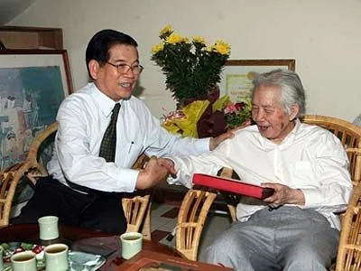 chu-tich-nuoc-nguyen-minh-triet-tang-qua-cho-hoa-si-nguyen-tu-nghiemanhttxvn.jpg